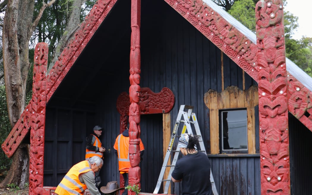 The 100-year-old carvings are removed from Te Wharepuni o Anehana at Anderson Park in Invercargill for restoration.