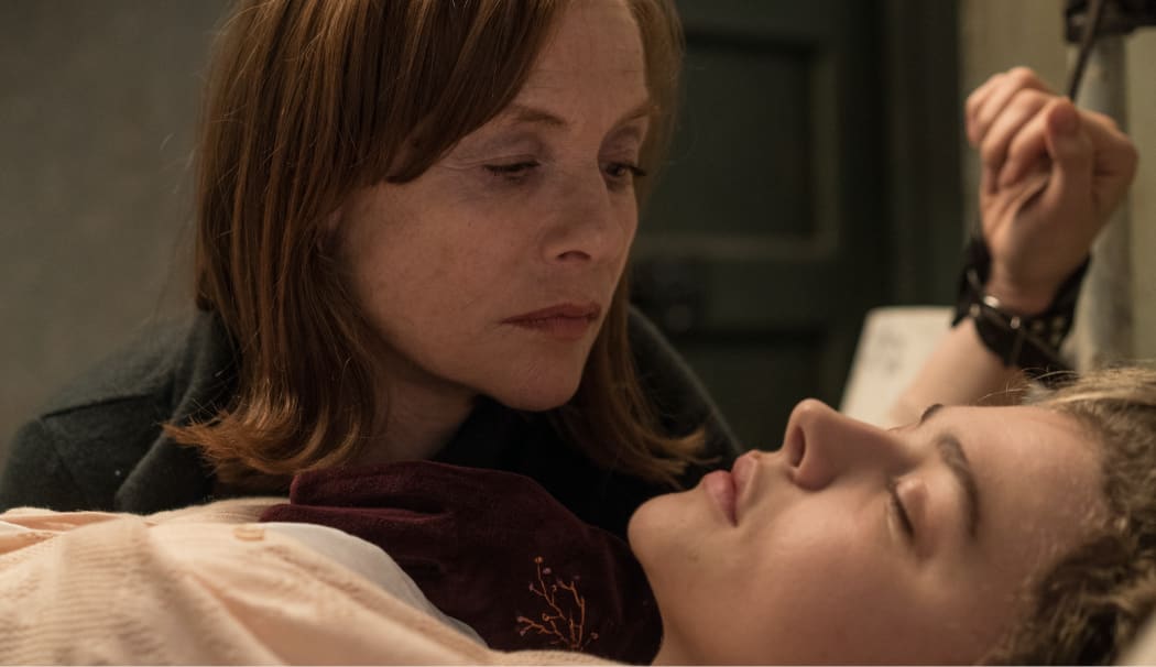 Isabelle Huppert and Chloë Grace Moretz share a moment in Neil Jordan’s thriller Greta.