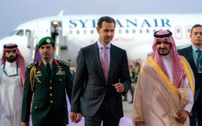 Deputy Emir of Mecca Prince Badr bin Sultan bin Abdulaziz (R) receiving Syrian President Bashar al-Assad in Jeddah on the eve of the Arab League Summit.