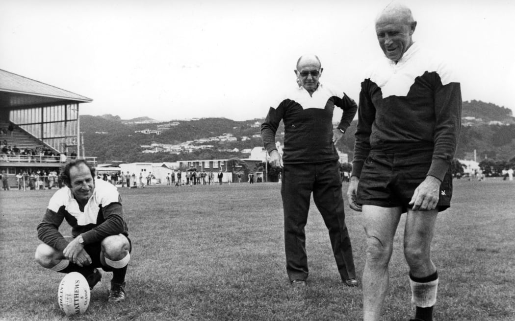 Bob Scott shows off his barefoot goalkicking skills during Petone celebrations (1970s). With Scott are Fergie McCormick (left) and legendary South African Okey Geffin.