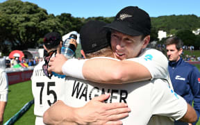 New Zealand's Neil Wagner is hugged by Matt Henry.