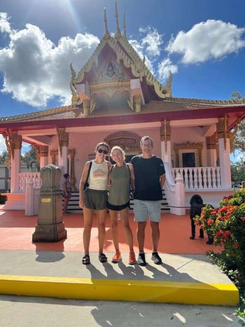 Sophie Rottenberg, Laura Reiley and Jon Rottenberg outside a Buddhist temple in Tampa, Florida, 2023.