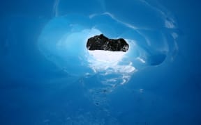 A hole in the ice on Fox Glacier.