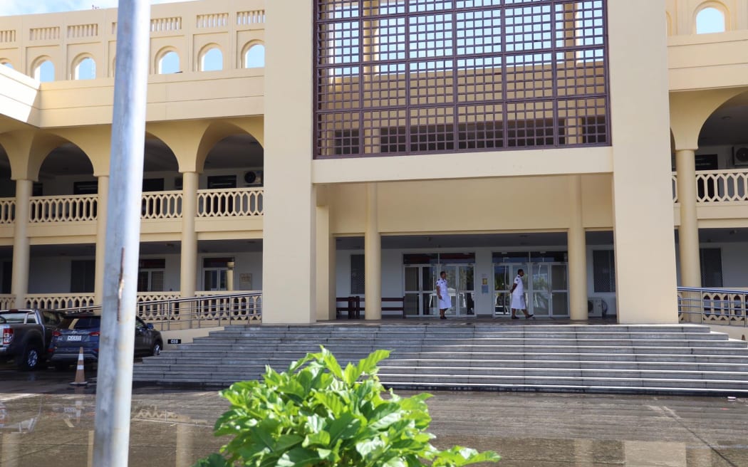 Police guard entrance at the Supreme Court in Samoa.