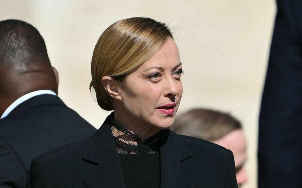 Italy's Prime Minister Giorgia Meloni arrives for late Pope Francis' funeral ceremony at St Peter's Square at the Vatican on April 26, 2025. (Photo by Alberto PIZZOLI / AFP)