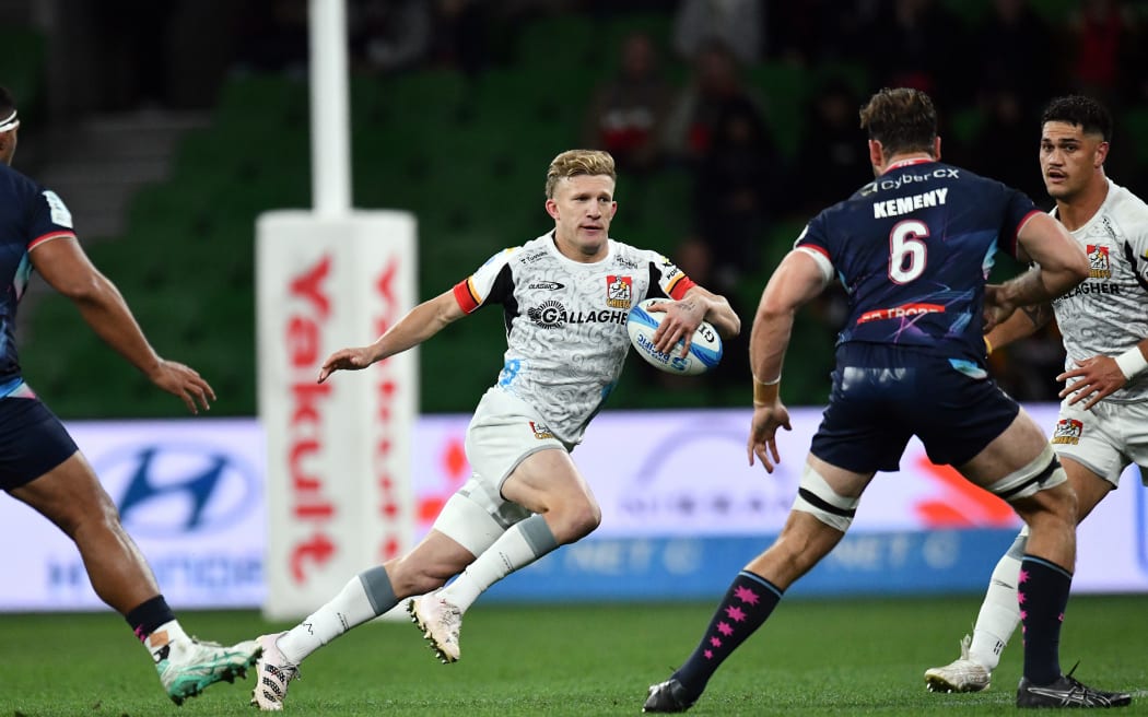 Chiefs' first-five Damian McKenzie in action against the Rebels.