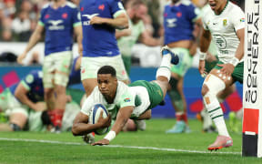 Grant Williams dives in to score his team's third try during the Autumn Nations Series 2025 match between France and South Africa.