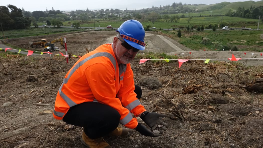 Environmental advisor Reuben Mills at midden site