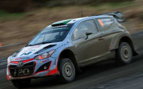 Hayden Paddon races during the first stage of the Rally of Wales, 2015.