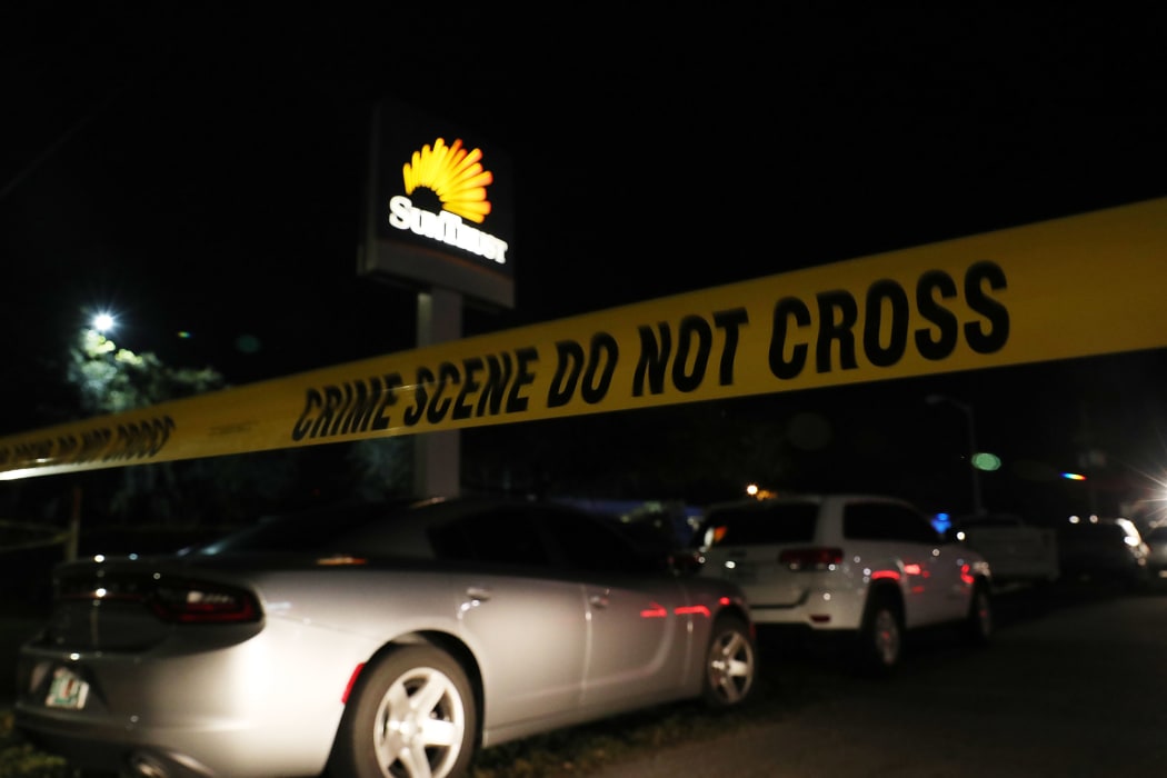 Police tape marks the scene where five people were killed at a SunTrust Bank branch on January 23, 2019 in Sebring, Florida.