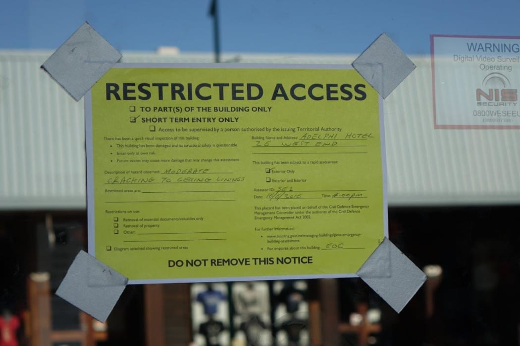 A yellow sticker warns of damage at Adelphi Hotel in Kaikōura.