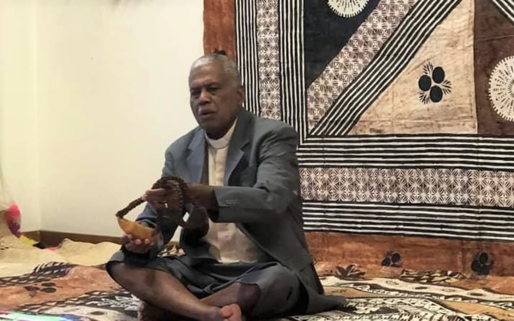 Rev Dr Semisi Turagavou receiving a whales tooth in the traditionall Fijian ceremony of welcome accorded to him by the Koroturaga Wesley Fijian church in Kapiti last Sunday. Photo: Koroturaga Fijian Wesley