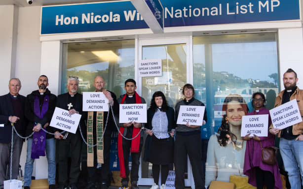 Priests chain themselves in front of electorate office, other ...
