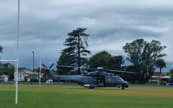 A NZDF helicopter lands at Victoria Square, Westport, to aid in relief efforts after heavy rain threatened to flood some areas in early February.