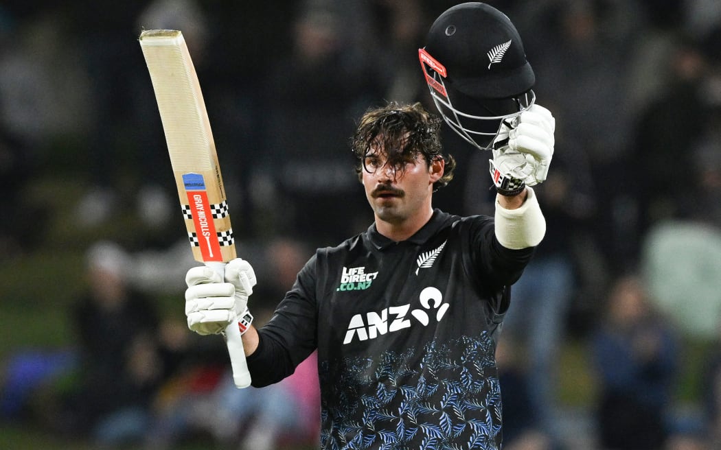 New Zealand’s Tim Robinson celebrates his century against Australia in the first game of the Chappell-Hadlee Trophy T20 cricket series at Bay Oval, Tauranga. 1 October 2025 © Photo: Andrew Cornaga / Photosport