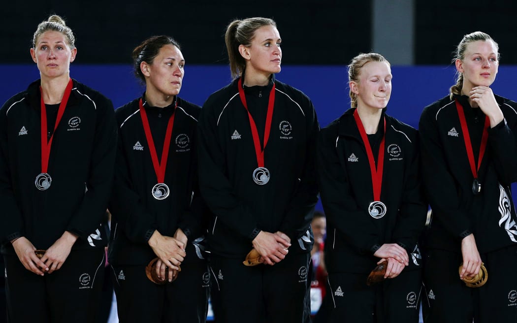 A disappointed Silver Ferns side with their silver medals at the Glasgow Commonwealth Games.