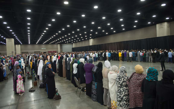 Guests and worshippers arrive at the service for Muhammad Ali .