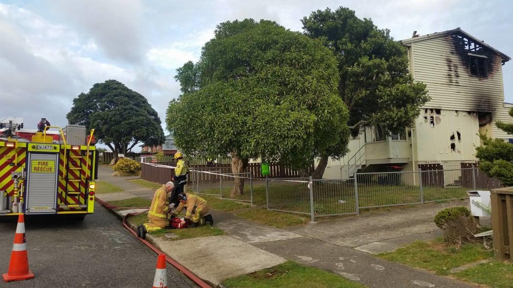 The damage from the suspected arson at a house at the centre of the Porirua siege.