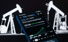 A Brent crude oil price chart is displayed on a smartphone screen in this photo illustration, as global oil markets react to escalating conflict involving Iran that pushes crude prices sharply higher on fears of supply disruptions in the Middle East in Brussels, Belgium, on March 9, 2026.