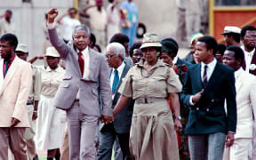 February 25, 1990, anti-apartheid leader and Nelson Mandela accompanied by his wife Winnie Mandela after being released from prison.