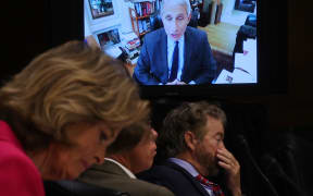 Senators listen to Dr. Anthony Fauci, director of the National Institute of Allergy and Infectious Diseases speak remotely during a Senate Health, Education, Labor and Pensions Committee hearing on Capitol Hill on 12 May 2020 in Washington, DC.