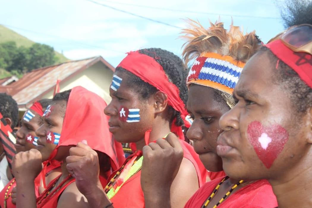 West Papuans demonstrating support for the Liberation Movement had the Papuan Morning Star flag emblazoned on body and garb.