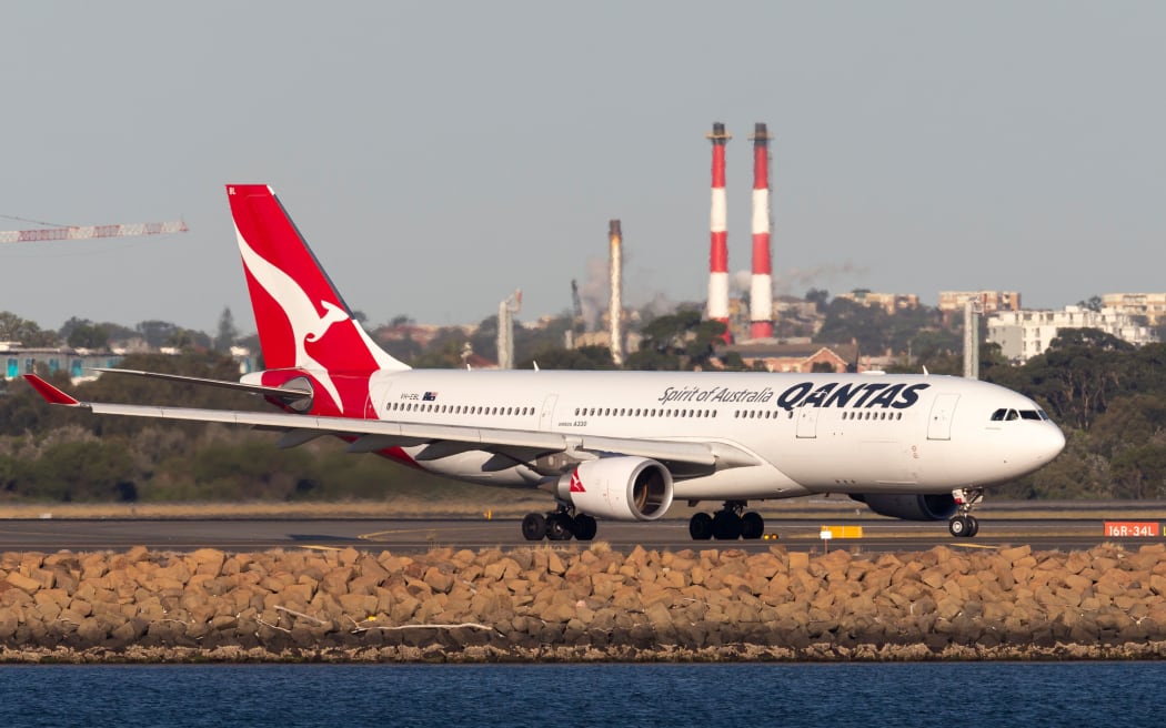 Sydney, Australia - October 9, 2013: Qantas Airbus A330 large passenger airliner on the tarmac at Sydney Airport.