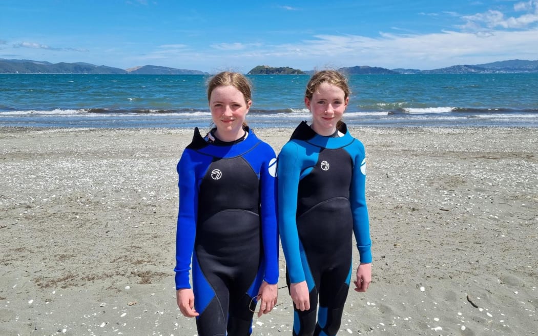 On the Petone Beach foreshore, 11-year-old twins Paige and Sammy Townsley are about to go for a dip in the sea.