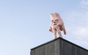 Ronnie van Hout's sculpture Quasi is five-metres tall, made of steel, polystyrene and painted resin.