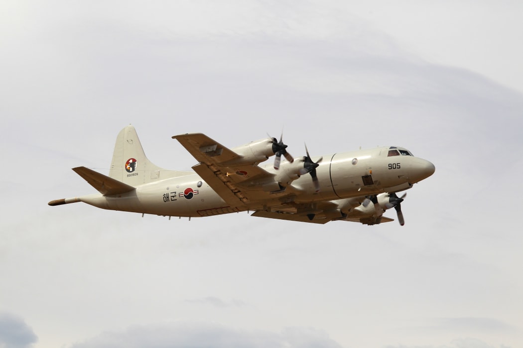 A South Korean P3 Orion takes off to search for Flight MH370.