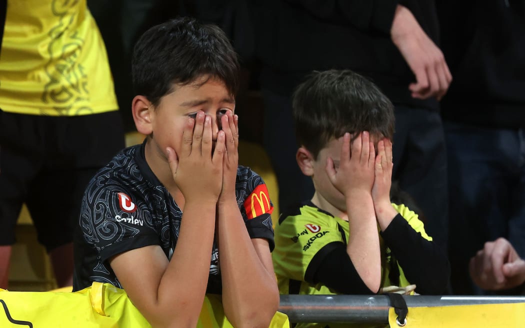 Fans react to the loss during the A-League Men’s Semi Final 1 (2nd leg) - Wellington Phoenix v Melbourne  Victory FC at Sky Stadium, Wellington on the 18th May 2024. © Copyright image by Marty Melville / www.photosport.nz