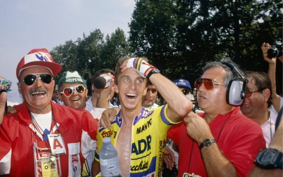American cyclist Greg LeMond celebrating victory in the 1989 Tour De France beating Laurent Fignon on the final day to record the narrowest victory in Tour history.
