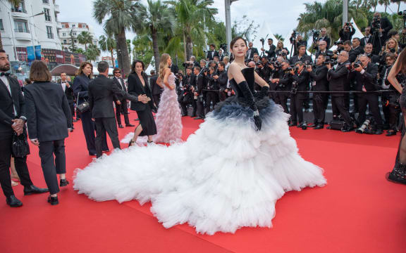 France, Cannes, 2024-05-14. Qian Hui on the red carpet for the opening night of the 77th Cannes Film Festival, with the out-of-competition film Le deuxieme acte of Quentin Dupieux. . Photograph by Roland MACRI / Hans Lucas.
France, Cannes, 2024-05-14. Qian Hui sur le tapis rouge de la soiree d ouverture du 77me Festival de Cannes, avec le film hors competition Le deuxieme acte
de Quentin Dupieux. . Photographie de Roland MACRI / Hans Lucas. (Photo by Roland Macri / Hans Lucas / Hans Lucas via AFP)