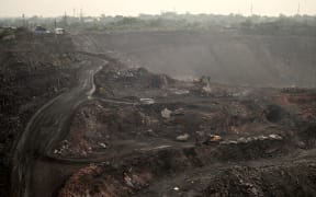 An open-cast coal mine on the outskirts of Dhanbad in India's Jharkhand state on 7 July, 2023.