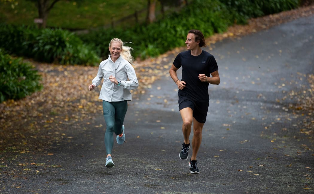 NZ long-distance runner Camille Buscomb and 400m hurdler Cameron French get in some lockdown exercise in Cambridge