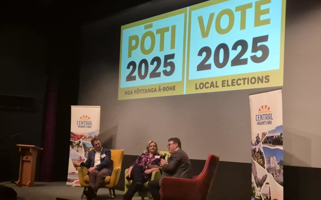 Local farmer Will Foley and Central Hawke's Bay Mayor Alex Walker on stage with moderator Jonathan Milne.