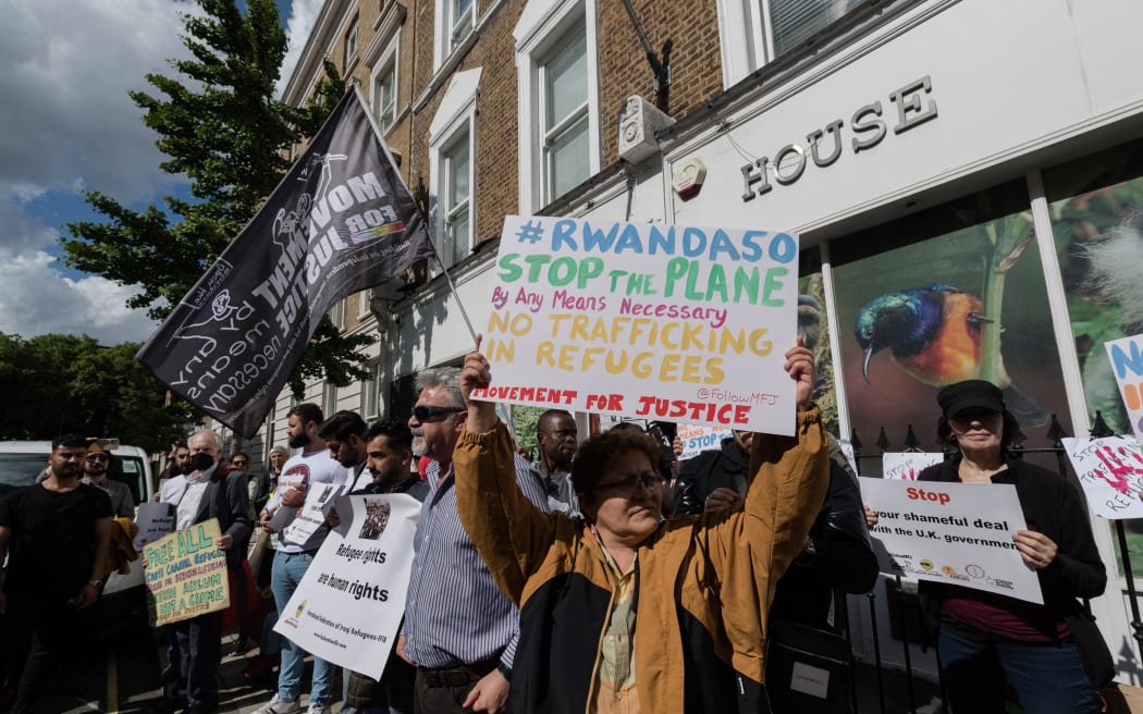 Protesters demonstrate outside the Rwanda High Commission against the Home Office's plan to relocate individuals identified as illegal immigrants or asylum seekers to Rwanda for processing, resettlement and asylum in London, United Kingdom on 8 June 2022.