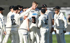 Kyle Jamieson celebrates the wicket of Alzarri Joseph
