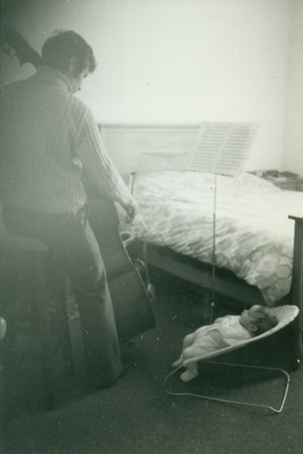 Baby Nick Tipping is serenaded by his father, Simon Tipping, in 1976.