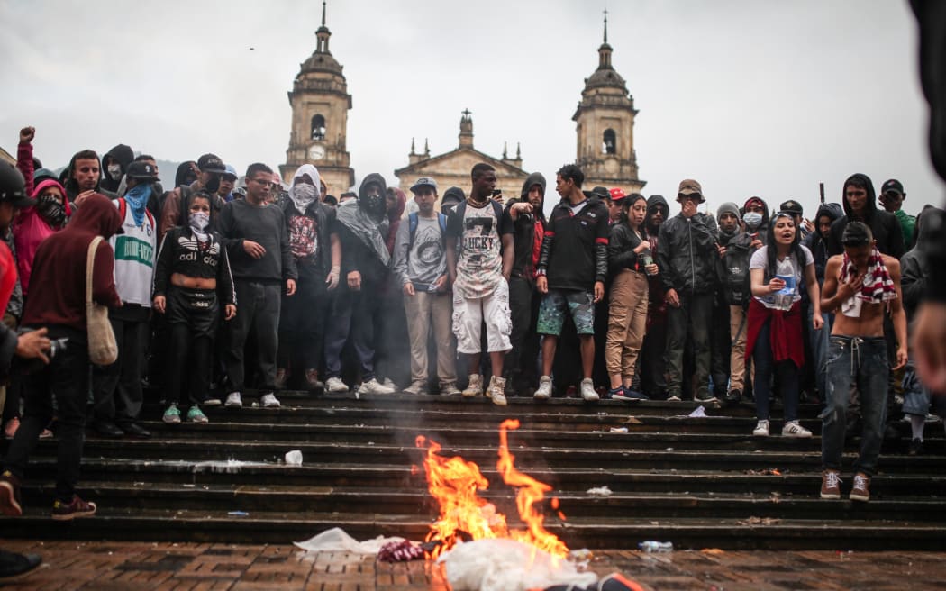 BOGOTA - COLOMBIA, NOVEMBER 21:  Thousands of protesters are seen streamed into the central Bolivar Square in clashes with the Mobile Anti-Disturbances Squadron (ESMAD in Spanish) in Bogota, Colombia on November 21, 2019.