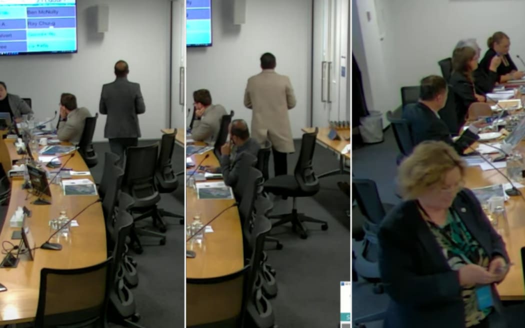 Councillors Ben McNulty, Diane Calvert and Nureddin Abdurahman walk out of the Wellington City Council meeting on 8 August, 2024.