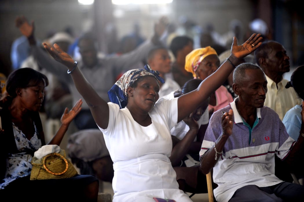 Haitians at Mass in Port-au-Prince on the fourth anniversary of the earthquake.