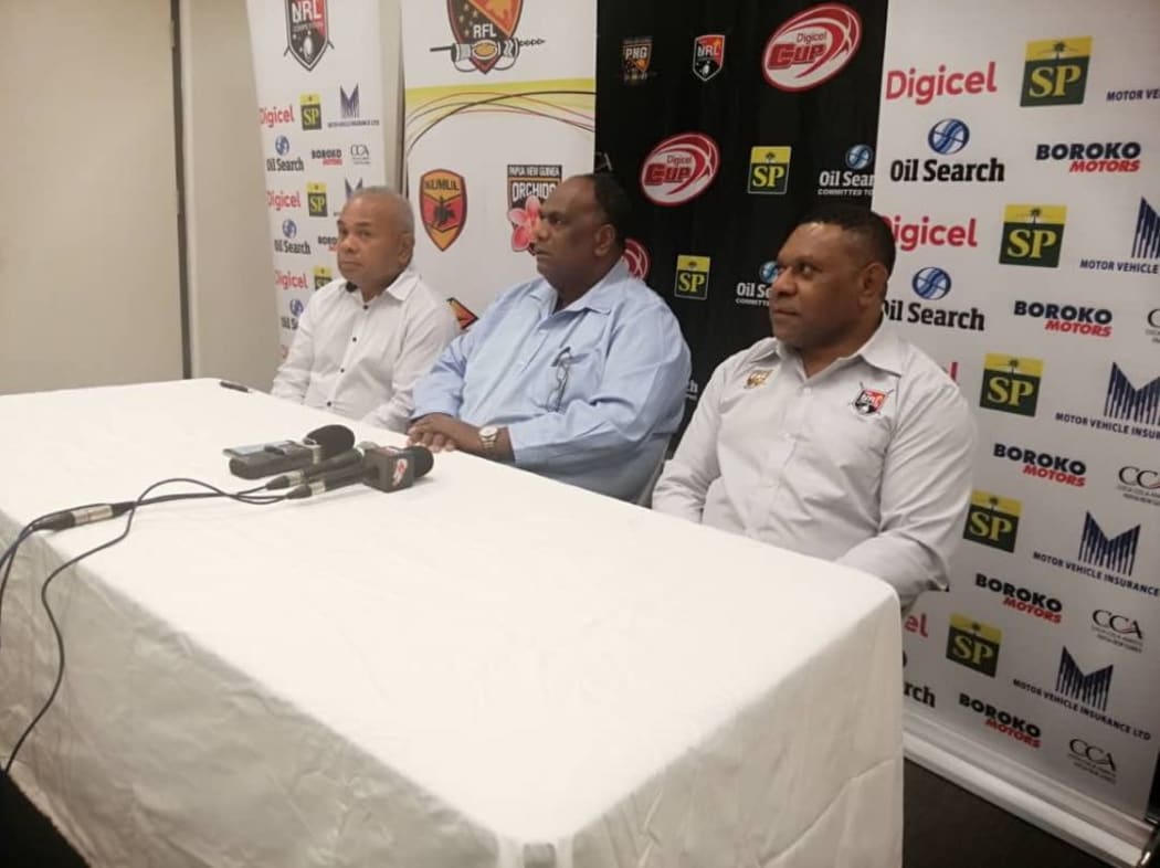 PNGRFL CEO Reatau Rau, Kimbe Cutters Chairman Dominic Kaumu and PNGNRL Competition Manager Stanley Hondina