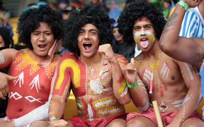Sevens fans partied despite wet and windy weather.
