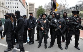 Members of the Black Panthers join other gun rights advocates in front of the State House as pro-gun supporters gather on January 18, 2021 in Richmond, Virginia. T
