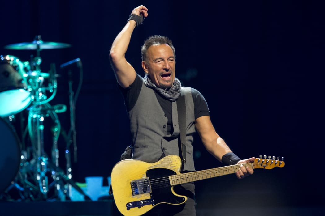 US musician Bruce Springsteen performs with The E Street Band at the AccorHotels Arena in Paris on July 11, 2016. (Photo by BERTRAND GUAY / AFP)