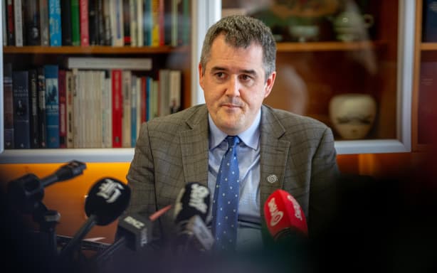 Housing Minister Chris Bishop announcing a major social housing shake-up at Parliament on 21 May 2026.