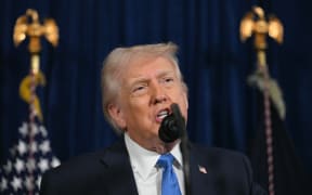 US President Donald Trump speaks to the press following US military actions in Venezuela, at his Mar-a-Lago residence in Palm Beach, Florida, on January 3, 2026. President Trump said Saturday that US forces had captured Venezuelan leader Nicolas Maduro after launching a "large scale strike" on the South American country. (Photo by Jim WATSON / AFP)