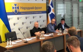 Arseniy Yatsenyuk (centre) of Ukraine's People's Front Party