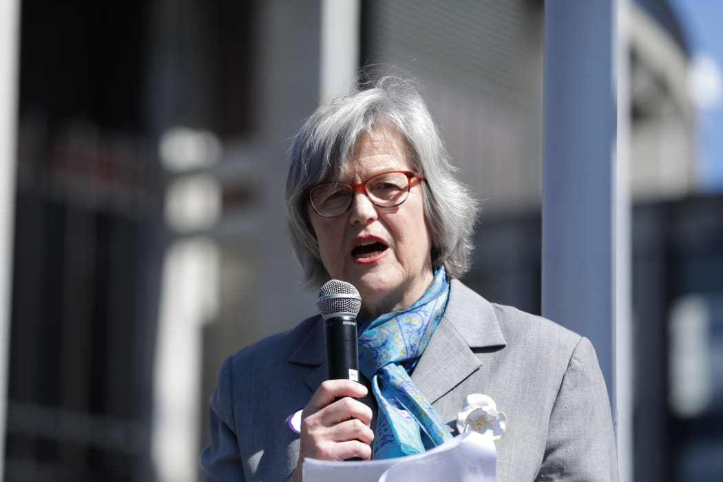 Eugenie Sage speaking on the steps of Parliament